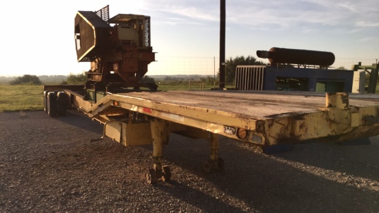 TRAILER MOUNTED ROCK CRUSHER ASSEMBLY