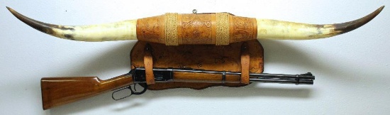 Pair of Texas Longhorns Mounted with Tooled Leather and Rifle Sling, 45 1/2" from Tip to Tip, Rifle