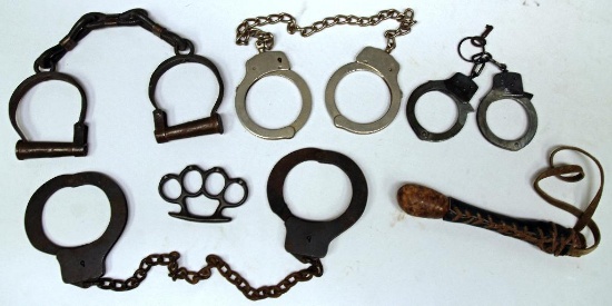 Mixed Lot Law Enforcement Leg Irons, Handcuffs, Sap, Brass Knuckles for Display Only
