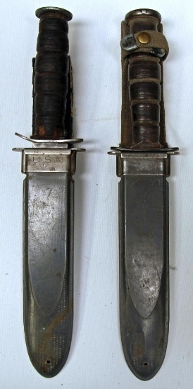 (2) WWII U.S.N. Mk 2 Military Knives in Sheath, B. M. Co. on Back of Sheath, Some Damage to One