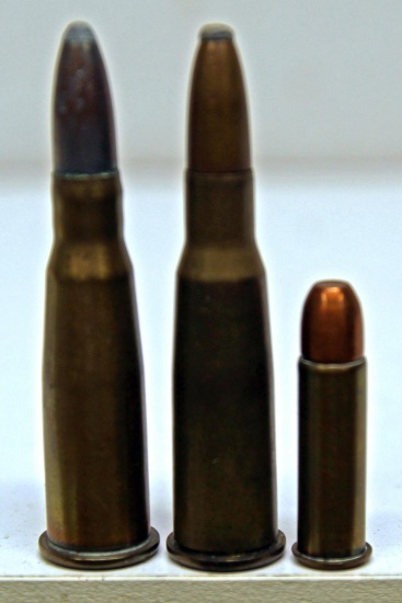 2 Rem UMC 8 mm Label Rifle Collector Cartridges and 1 Unmarked 8 mm Label Pistol Collector Cartridge