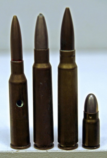 6.5 mm Japanese Ariska Dummy Rifle Cartridge, 2 7.7 mm Japanese Rifle Cartridges, 1 8 mm Japanese