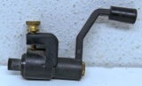 Hand Crank Mounts on Trigger Guard of Ruger 10/22 to hand crank out the rounds...