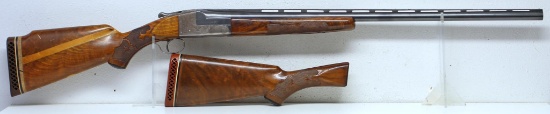 Ithaca Single Barrel Trap Grade 4 12 Ga. Single Shot Shotgun Modified Stock on it that raised the