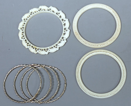 Three Old Carved Ivory Bracelets and Four Believed to be Sterling Silver Bracelets Not Marked...