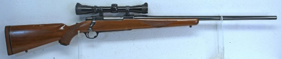 Ruger...Model 77 .338 Win. Mag. Bolt Action Rifle w/Leupold Scope... SN#77-35557