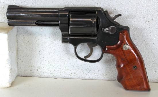 Smith & Wesson Model 581 .357 Mag. Double Action Revolver... 4" Barrel... Considerable Wear to Wood