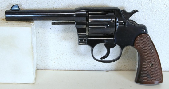 Colt New Service .45 Colt. Double Action Revolver 5 1/2" Barrel... Plastic Grips... Reblued at Some