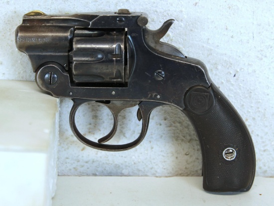 H&R Tip-Up .22 Rimfire Double Action Revolver 1 1/4" Barrel Some Damage at Bottom of Target Grips