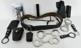 Large Lot of Various Holsters & Handcuffs