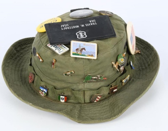 OD green U.S. Military hat with vintage pins