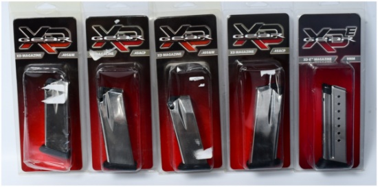 A Group of Five Springfield Armory XD Magazines, New in Blister Packaging, .40 S&W, .45 ACP, and 9mm