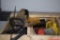 Various tools including flashlights, hammer, gloves