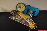 1997 Super Bowl XXXI Gift Bag Green Bay Packers Promotional Clock, Hat and other small items.