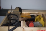 Various tools including flashlights, hammer, gloves