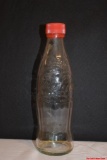 1997 Vintage Clear Embossed Glass German Coca-Cola Swimming Athlete Bottle