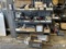 Truck parts on 2 racks including electronic and dash parts, pneumatic lines