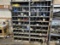 Truck parts cubby hole cabinet with assorted truck parts