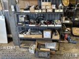 Truck parts on 2 racks including electronic and dash parts, pneumatic lines