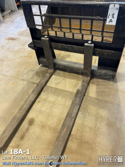 Fork attachment for CAT skidsteer loader