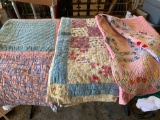 Three homemade quilts