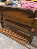Wooden full bed with rails