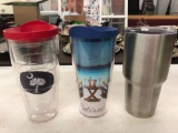 2 tervis cups and 1 ozark trail cup
