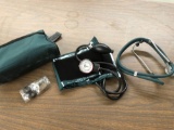 Blood pressure cuff, stethoscope, and carrying case.