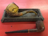 Carved wood tray and 2 pipes.