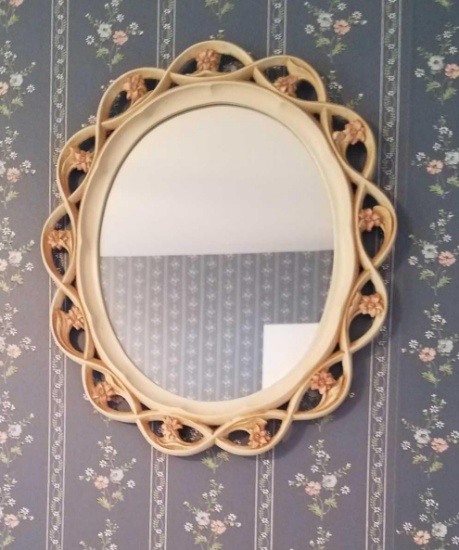 Oval mirror with flowers