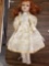Porcelain doll with Auburn hair