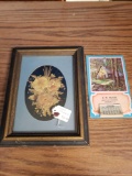 Pressed flowers in frame and 1952 calendar