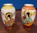 2 occupied japan vases