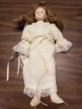 Porcelain doll cream dress