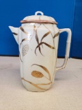Ceramic pitcher with lid