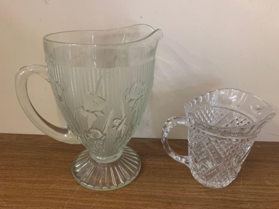 2 cut glass pitchers