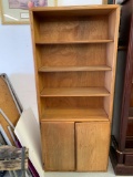 4 shelf bookcase with bottom cabinet doors