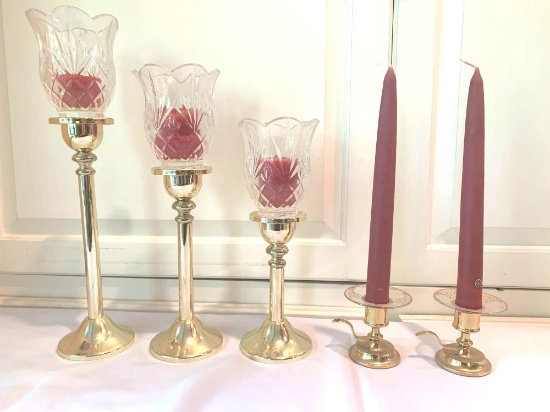 2 sets of candleholders