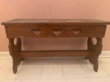 Wooden bench with hearts