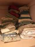 Lots of dish cloths and hand towels