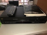 JVC dvd and vcr player with remote and books