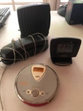 Sony CD player, Emerson telephone, westclox, Motorola router