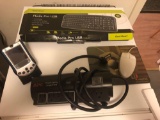 Keyboard, surge protector, palm pro, mouse and mouse pad