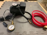 Tire air pump/gauge