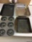 Various metal baking dishes, one lid