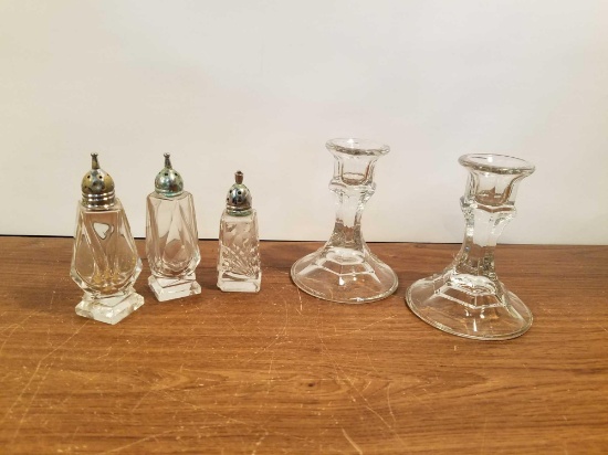 3 Salt and Pepper Shakers and 2 Candle Holders