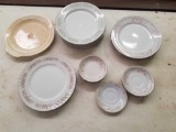 Assorted (some matching) Plates, Saucers, bowls, and Serving Tray