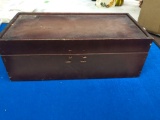 Wooden box with vintage belts