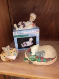 Cat and boy figurines