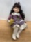 Sitting Porcelain Doll